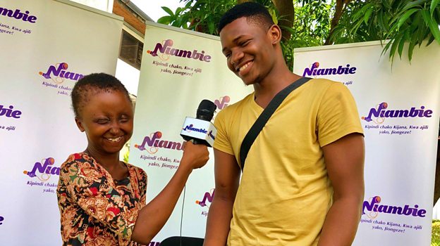 Miriam and Malick, young journalists with disabilities who were employed by the Niambie radio show.